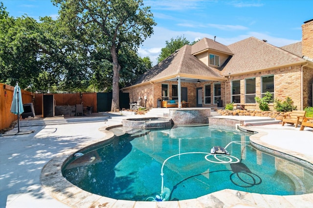 2616 NW Lambda Ln, Flower Mound, TX 75028 - view of swimming pool featuring a fenced backyard, a patio area, a pool with connected hot tub, and a ceiling fan
