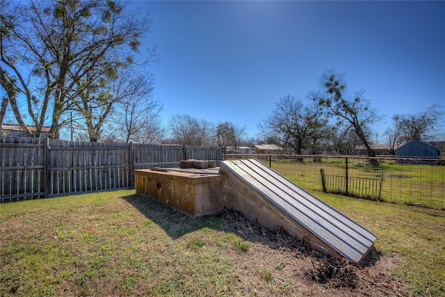 view of yard featuring fence