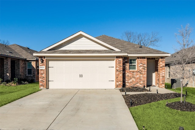 ranch-style home with a garage, driveway, brick siding, and a front yard