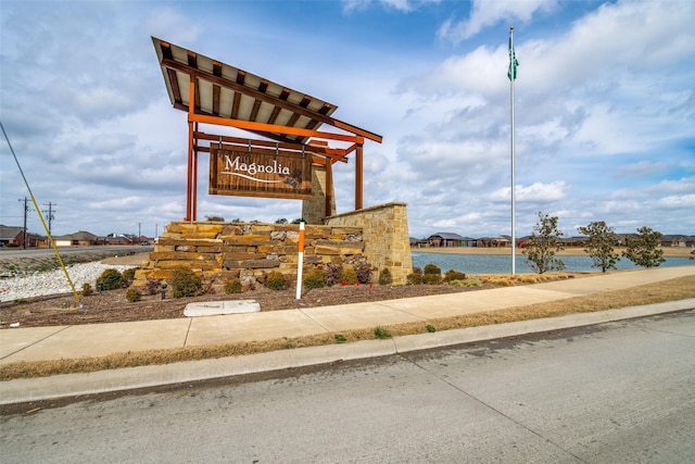 view of community sign