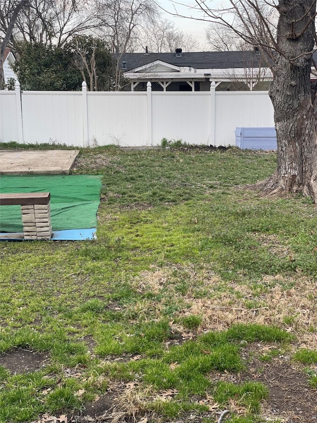 view of yard featuring fence