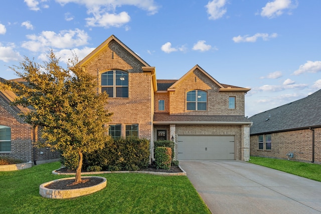 traditional-style home featuring concrete driveway, brick siding, a front lawn, and an attached garage