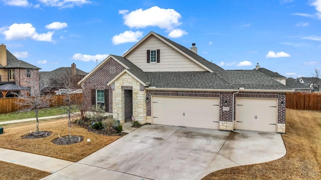 view of front of property with a garage, driveway, a shingled roof, stone siding, and fence