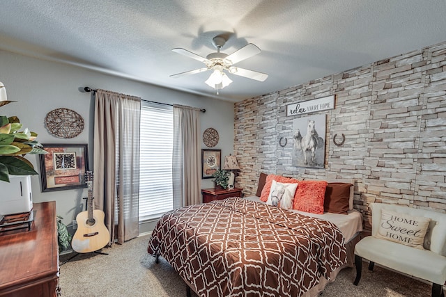 bedroom featuring a textured ceiling, multiple windows, and carpet