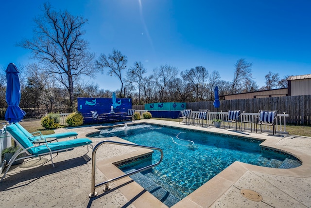 view of pool featuring a fenced in pool, a patio, and fence