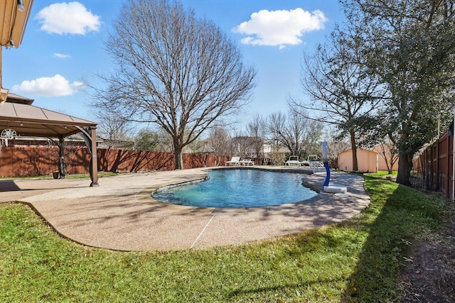 view of pool with a gazebo, a patio, a fenced backyard, and a fenced in pool