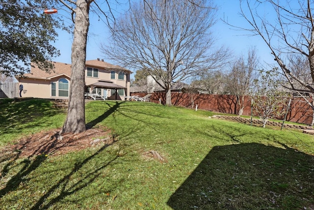 view of yard featuring a fenced backyard and a gazebo