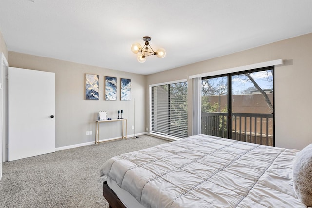 carpeted bedroom with baseboards, a chandelier, and access to exterior