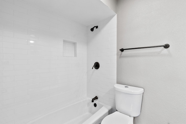 full bathroom featuring shower / bathtub combination, a textured wall, and toilet