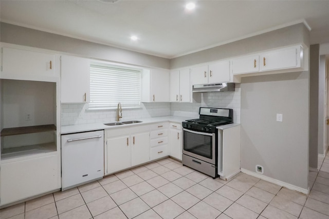 kitchen with white dishwasher, light countertops, under cabinet range hood, a sink, and gas stove