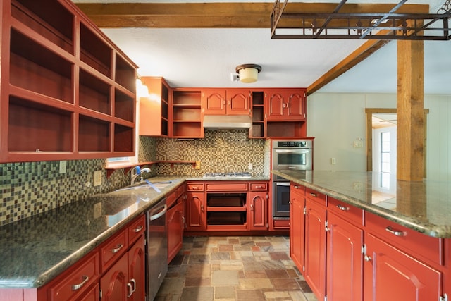 114 Adelia Dr, Mabank, TX 75156 - kitchen with stone finish flooring, under cabinet range hood, appliances with stainless steel finishes, open shelves, and tasteful backsplash