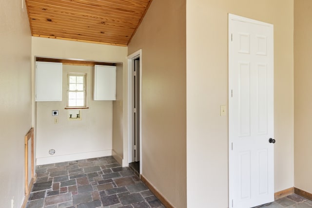 114 Adelia Dr, Mabank, TX 75156 - laundry area featuring stone tile floors, baseboards, wood ceiling, hookup for a washing machine, and electric dryer hookup