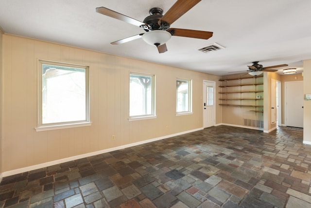 114 Adelia Dr, Mabank, TX 75156 - empty room with a ceiling fan, visible vents, and baseboards