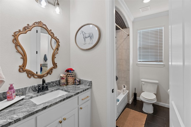 full bathroom featuring toilet, ornamental molding, vanity, baseboards, and tile patterned floors