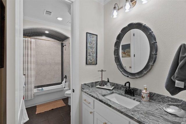 bathroom with visible vents, shower / bathtub combination with curtain, toilet, vanity, and tile patterned floors