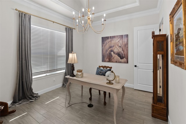 office featuring a raised ceiling, an inviting chandelier, ornamental molding, wood tiled floor, and baseboards