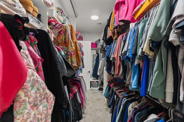 walk in closet with carpet and visible vents