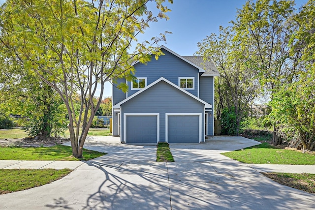 view of front of home with a garage and driveway