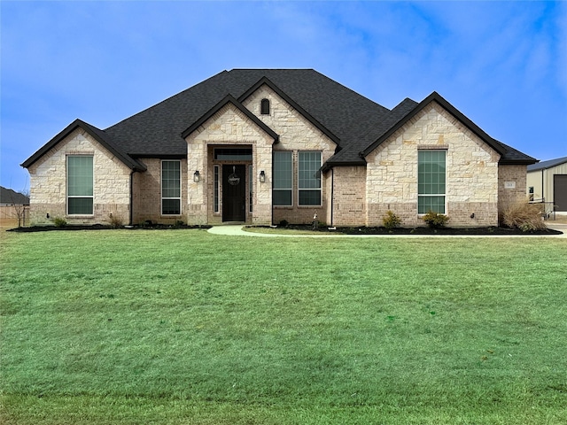 213 Stuart St, Paradise, TX 76073 - french country inspired facade with stone siding, a shingled roof, and a front yard