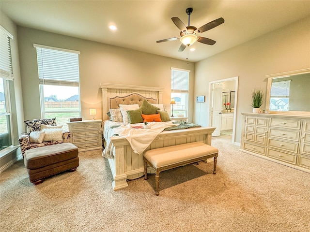 213 Stuart St, Paradise, TX 76073 - bedroom with light colored carpet, recessed lighting, ensuite bath, and ceiling fan