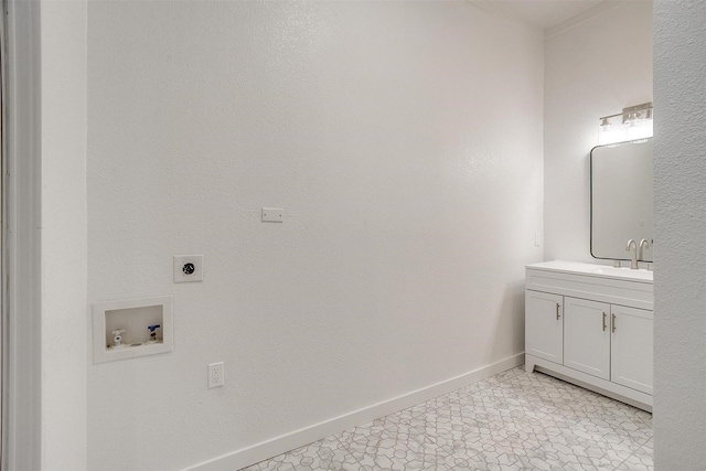 bathroom featuring vanity and baseboards