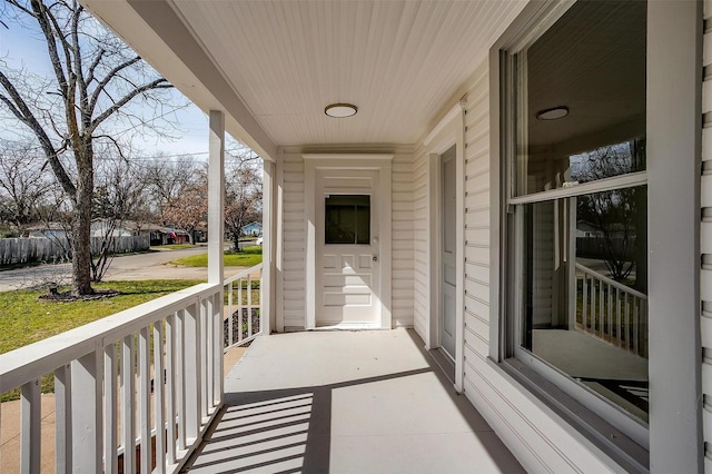 balcony featuring a porch