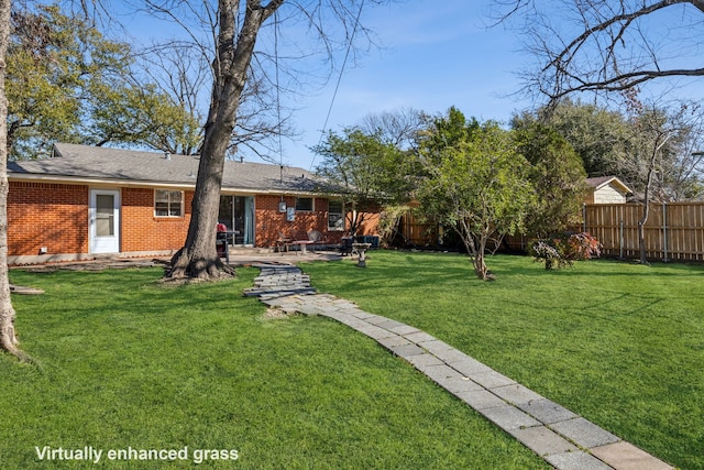 view of yard with a patio area and fence