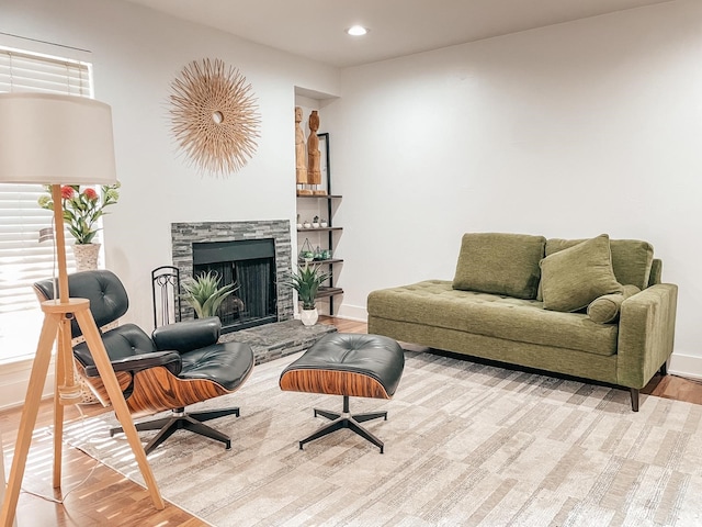 18333 Roehampton Dr Unit 123, Dallas, TX 75252 - kitchen featuring stainless steel appliances, island range hood, light marble finish flooring, white cabinets, and light countertops