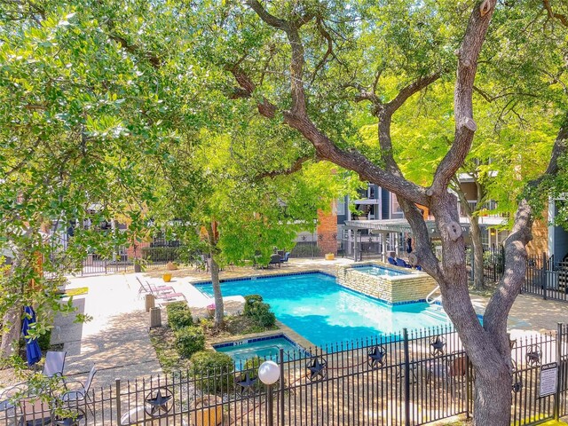 18333 Roehampton Dr Unit 123, Dallas, TX 75252 - full bath featuring marble look tile flooring, toilet, vanity, walk in shower, and a textured ceiling