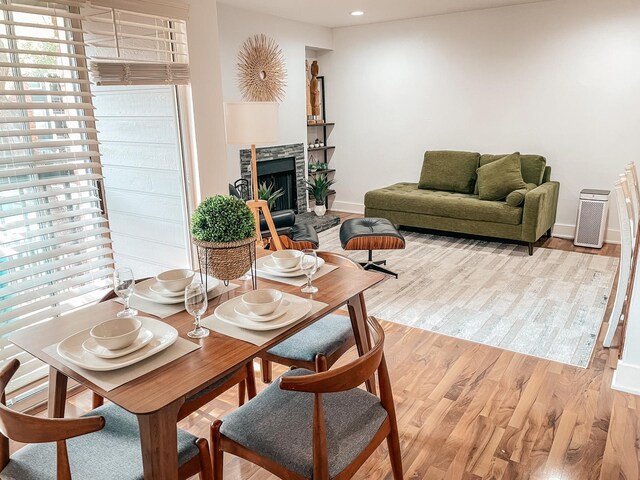 18333 Roehampton Dr Unit 123, Dallas, TX 75252 - sitting room featuring a ceiling fan, baseboards, and light wood-style floors