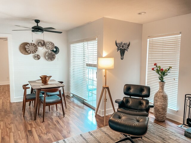 18333 Roehampton Dr Unit 123, Dallas, TX 75252 - sitting room with recessed lighting, wood finished floors, a tile fireplace, and baseboards