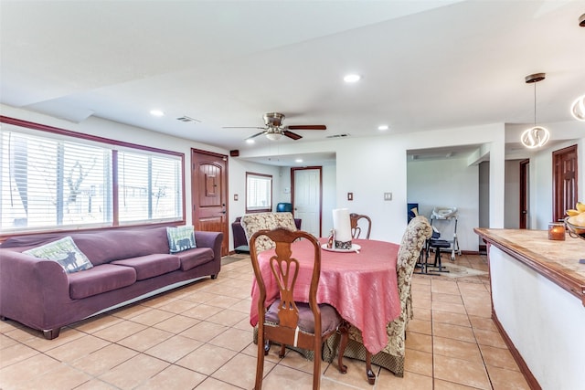 dining room featuring light tile patterned floors, recessed lighting, a ceiling fan, baseboards, and visible vents