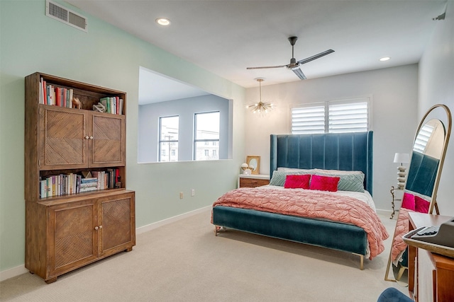 bedroom with carpet floors, recessed lighting, visible vents, and baseboards