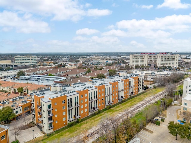 birds eye view of property featuring a view of city