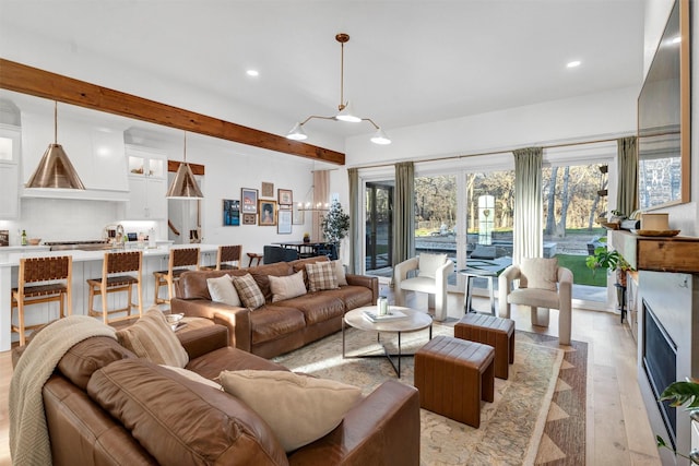 living area featuring recessed lighting and light wood finished floors