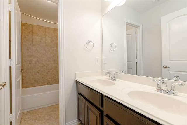 full bathroom featuring double vanity, tile patterned flooring, shower / bath combination, and a sink