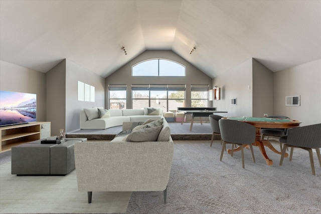 living room featuring carpet, visible vents, and high vaulted ceiling