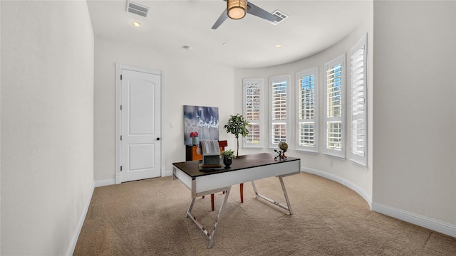 carpeted office with a ceiling fan, recessed lighting, visible vents, and baseboards