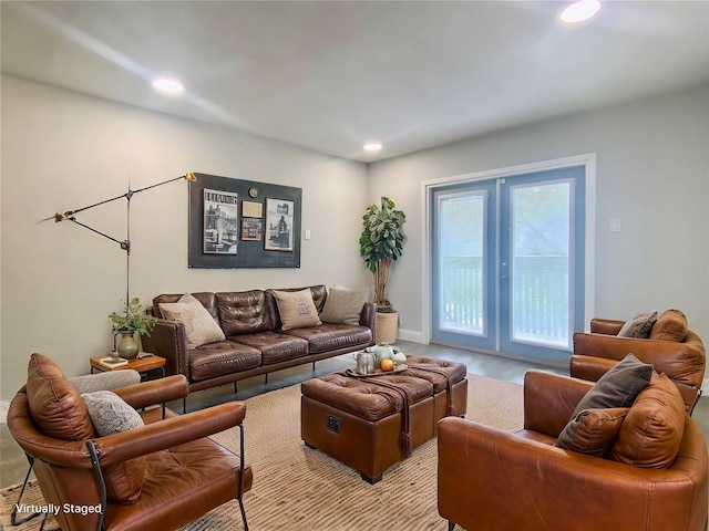 living room featuring wood finished floors and recessed lighting