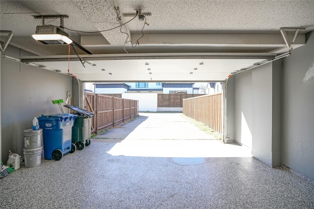 garage featuring a garage door opener