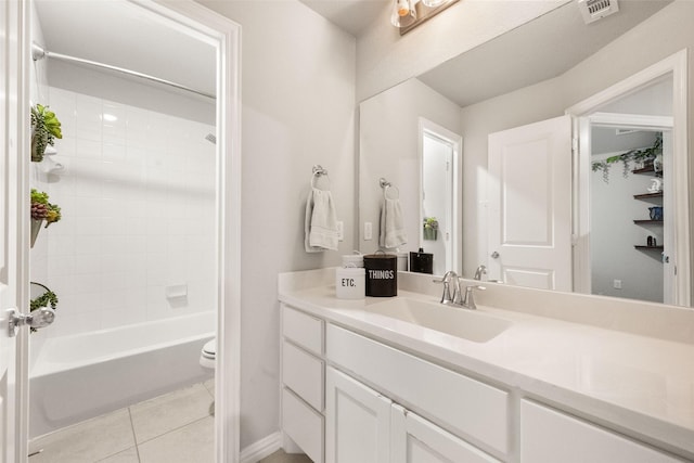 full bathroom featuring visible vents, toilet, tub / shower combination, vanity, and tile patterned flooring