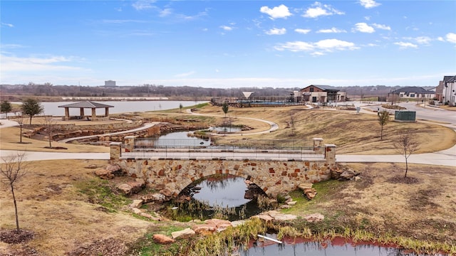 view of yard with a water view and a gazebo