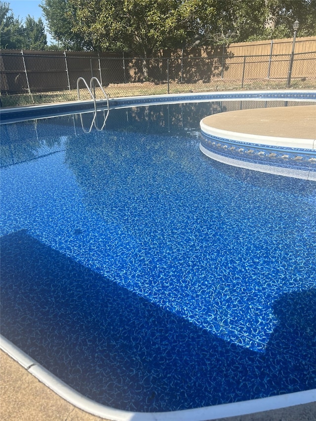 view of pool featuring fence and a fenced in pool