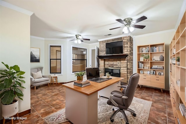 office area featuring baseboards, visible vents, dark tile patterned flooring, ceiling fan, and crown molding