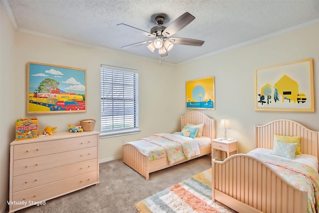 bedroom with carpet, a textured ceiling, ceiling fan, and crown molding