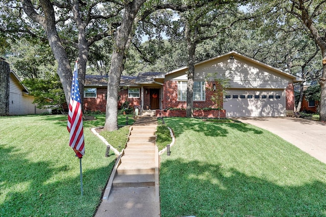 ranch-style home featuring a front lawn, an attached garage, brick siding, and driveway