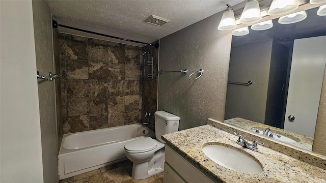 bathroom with a textured ceiling, a textured wall, toilet, and visible vents