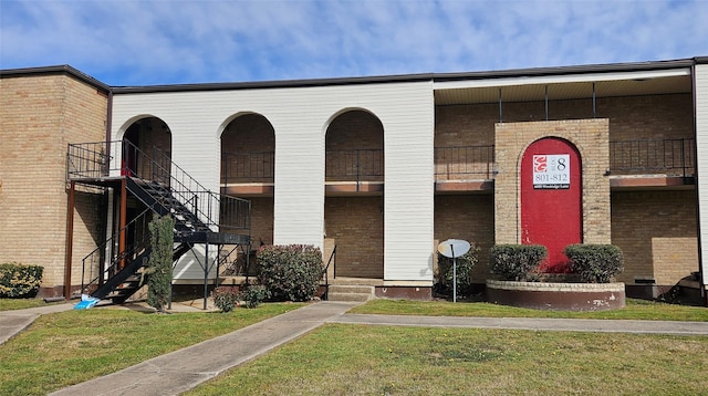 view of property with stairs