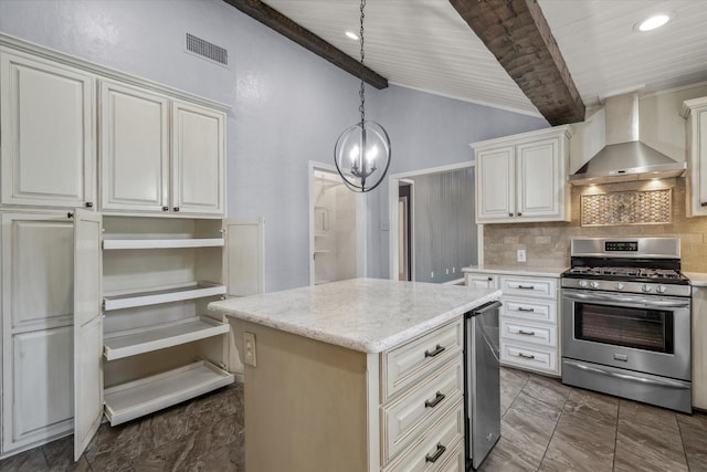 kitchen with lofted ceiling with beams, wall chimney range hood, decorative backsplash, light stone countertops, and stainless steel range with gas stovetop