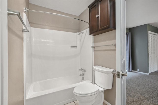 full bathroom with washtub / shower combination, baseboards, and toilet